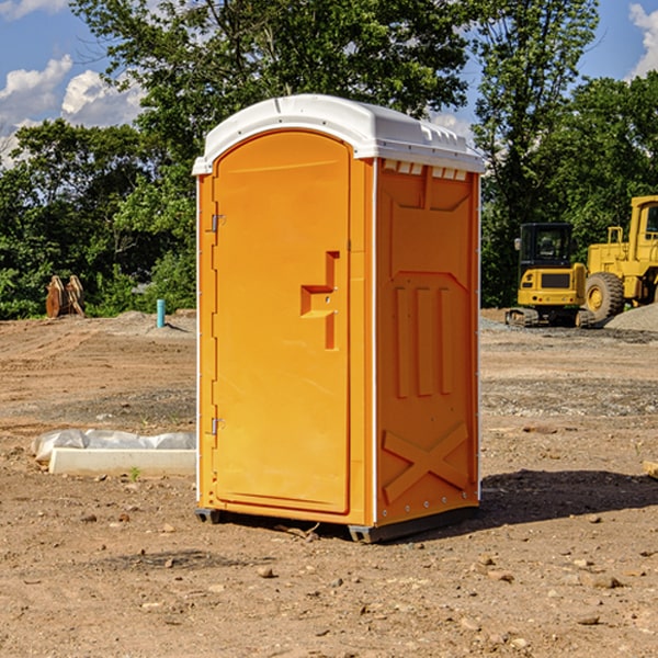 how often are the porta potties cleaned and serviced during a rental period in Green Road